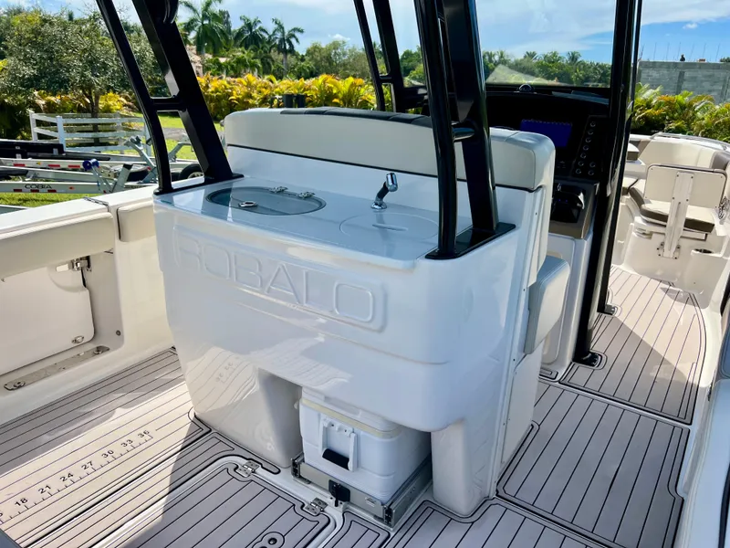 Slide: The Image of 2021 Robalo R272 Center Console boat interior with sleek design and modern amenities. - 34