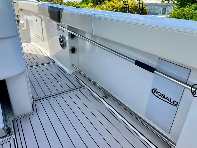 Slide: The Image of 2021 Robalo R272 Center Console boat deck with sleek design and modern features. - 44