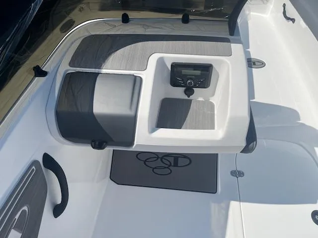 Slide: The Image of 2025 Tahoe T21 boat interior with modern dashboard and seating. - 10