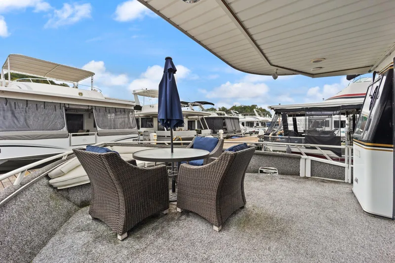 Slide: The Image of Monticello 18 X 70 River Yacht 2003 with outdoor seating on deck. - 28