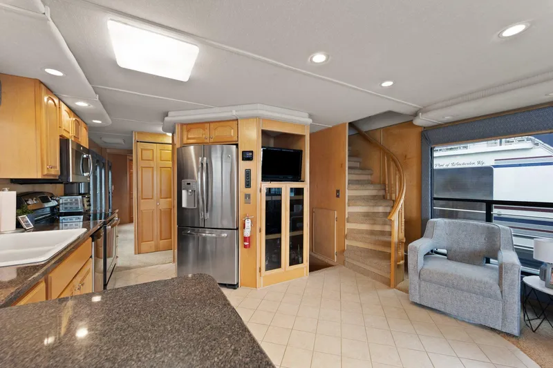 Slide: The Image of Luxurious 2003 Monticello 18 X 70 River Yacht interior with modern kitchen and cozy seating. - 33