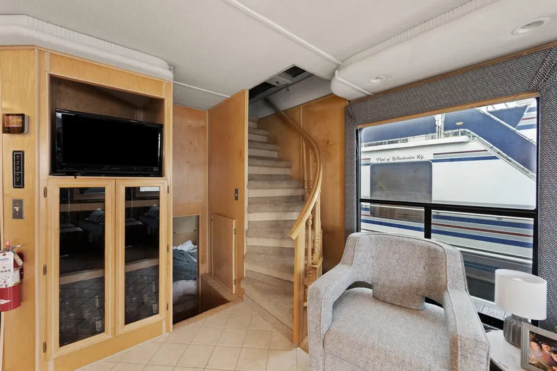 Slide: The Image of Interior of 2003 Monticello 18 X 70 River Yacht with stairs and seating area. - 34