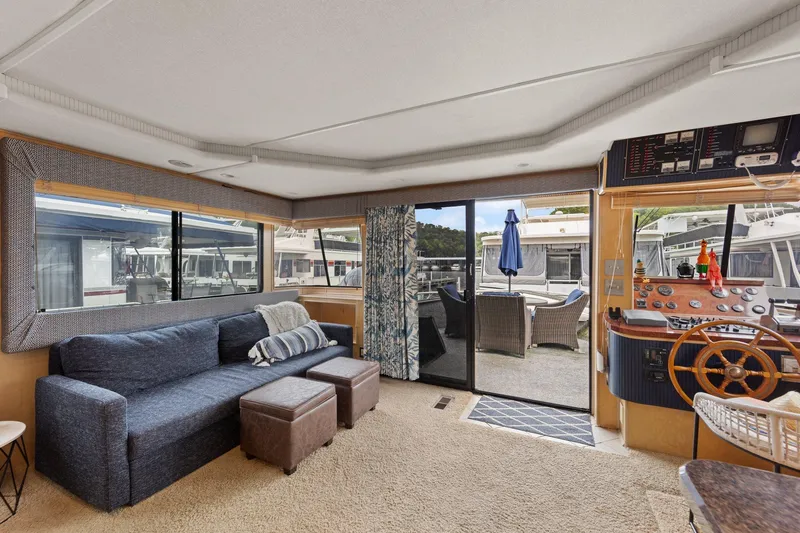 Slide: The Image of Interior of 2003 Monticello 18 X 70 River Yacht with cozy seating and helm. - 37