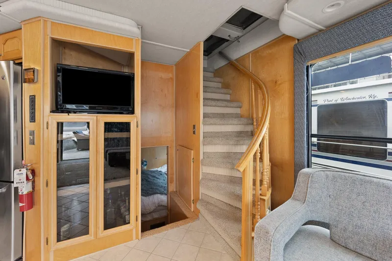 Slide: The Image of Interior of 2003 Monticello 18 X 70 River Yacht with stairs and TV. - 39