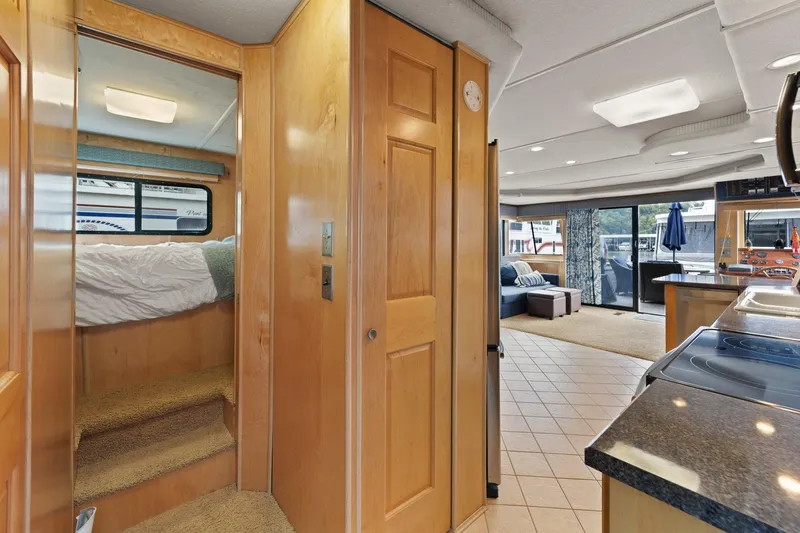 Slide: The Image of Interior of 2003 Monticello 18 X 70 River Yacht with modern kitchen and cozy living area. - 41