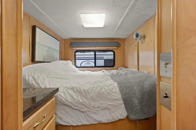 Slide: The Image of Cozy bedroom in 2003 Monticello 18 X 70 River Yacht with window view. - 43