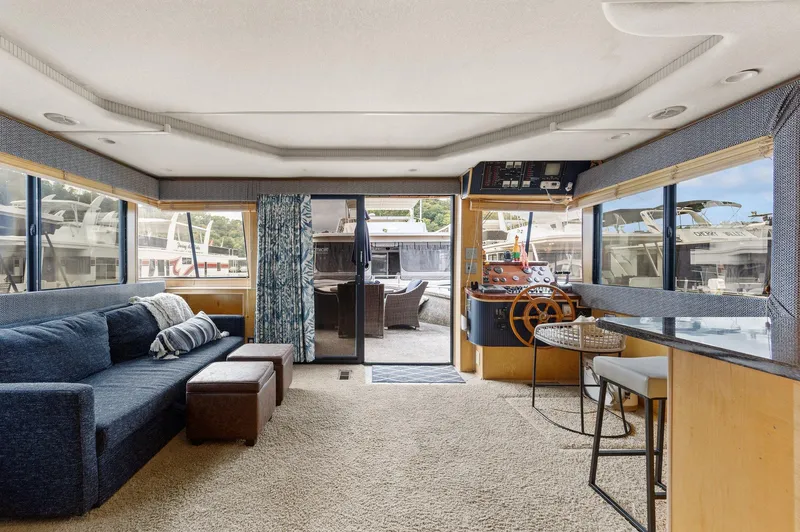 Slide: The Image of Interior of 2003 Monticello 18 X 70 River Yacht with cozy seating and helm station. - 48