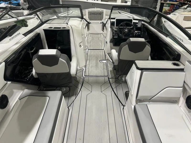Slide: The Image of 2025 Yamaha Boats 252XE interior with modern seating and sleek design. - 5
