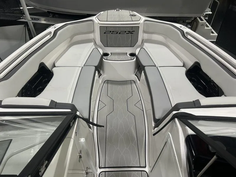 Slide: The Image of 2025 Yamaha Boats 252XE interior with sleek seating and modern design. - 7