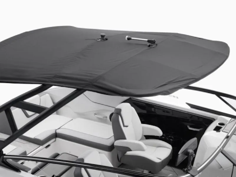 Slide: The Image of 2025 Yamaha Boats 252XE interior with canopy, featuring sleek seating and modern design. - 8