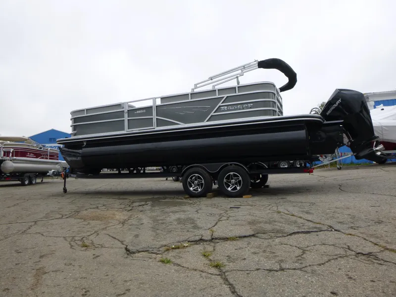 Slide: The Image of 2024 Ranger Reata 223C pontoon boat on trailer, side view. - 14