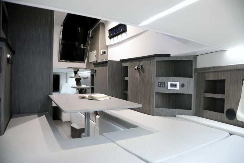 Slide: The Image of Luxurious interior of 2025 Ranieri CAYMAN 45.0 Cruiser with modern furnishings and sleek design. - 15