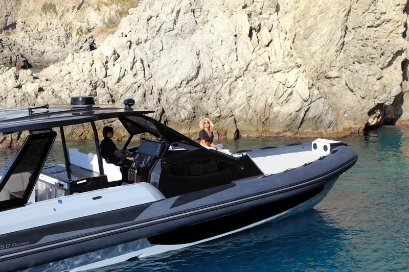 Slide: The Image of 2025 Ranieri CAYMAN 45.0 Cruiser in scenic coastal waters. - 4