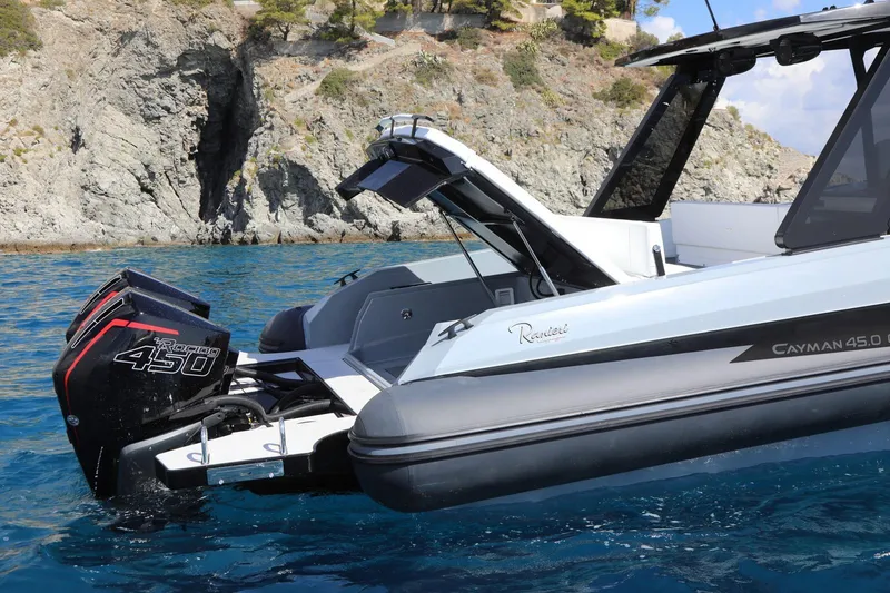 Slide: The Image of 2025 Ranieri CAYMAN 45.0 Cruiser in scenic coastal waters. - 6