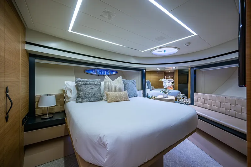 Slide: The Image of Luxurious bedroom interior of 2014 Pershing 92 yacht with modern design and elegant furnishings. - 15