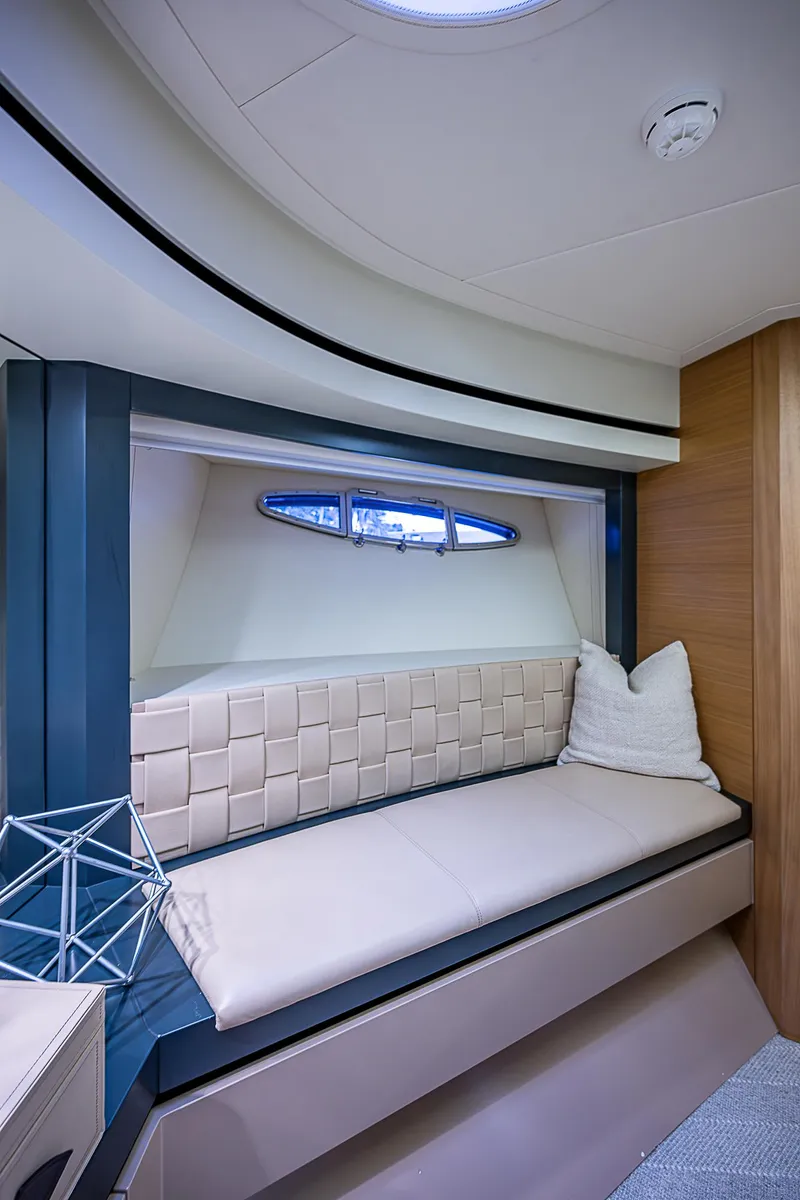 Slide: The Image of Luxurious interior of 2014 Pershing 92 yacht with modern seating and window view. - 17