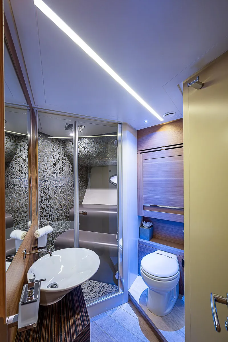 Slide: The Image of Luxurious bathroom in 2014 Pershing 92 yacht with modern fixtures and elegant design. - 19