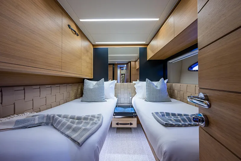 Slide: The Image of Luxurious twin cabin interior of 2014 Pershing 92 yacht with modern design. - 20