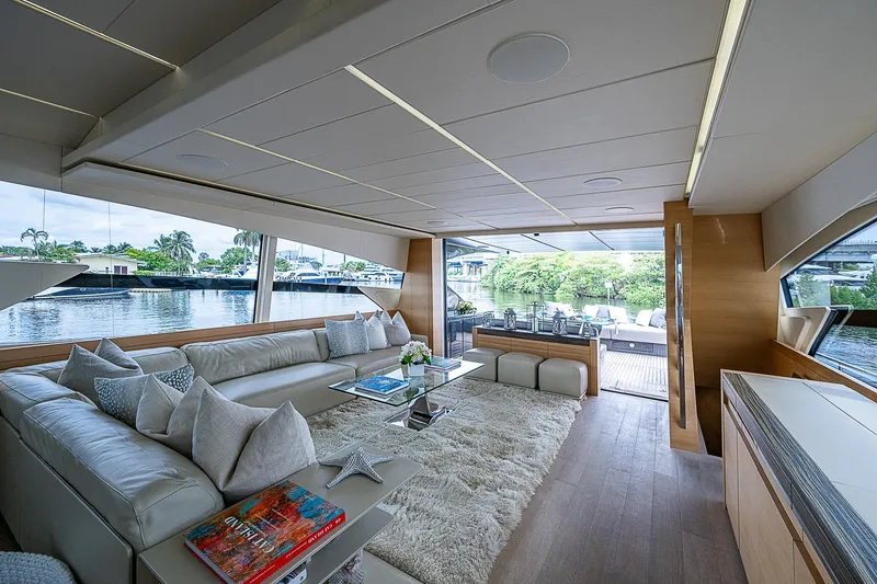 Slide: The Image of Luxurious interior of 2014 Pershing 92 yacht with elegant seating and scenic water views. - 3