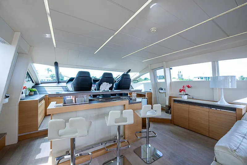 Slide: The Image of Luxurious interior of 2014 Pershing 92 yacht with modern seating and sleek design. - 4