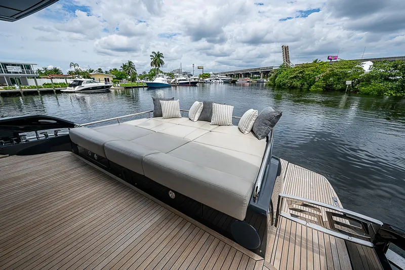 Slide: The Image of Luxurious 2014 Pershing 92 yacht with spacious deck and scenic waterfront view. - 40