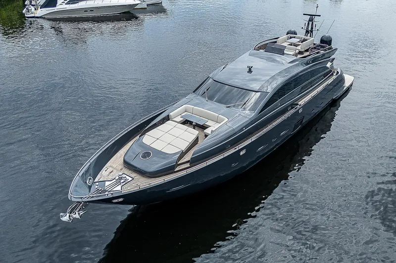 Slide: The Image of Luxurious 2014 Pershing 92 yacht cruising on calm waters. - 46