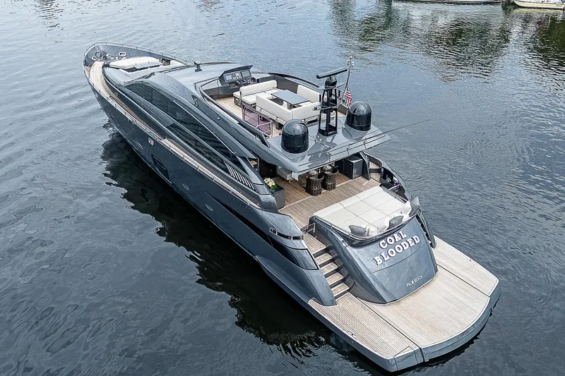 Slide: The Image of 2014 Pershing 92 luxury yacht on water, sleek design, spacious deck. - 47