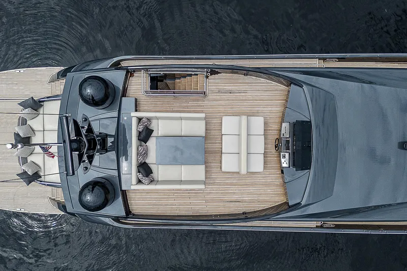 Slide: The Image of Top view of a luxurious 2014 Pershing 92 yacht with elegant deck seating. - 49