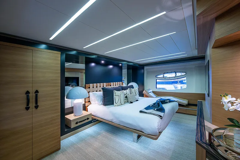 Slide: The Image of Luxurious bedroom interior of 2014 Pershing 92 yacht with modern design and elegant furnishings. - 9