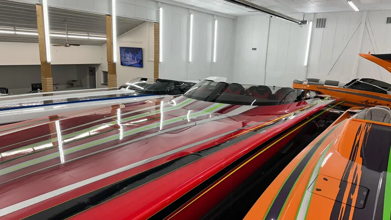 Slide: The Image of Colorful Skater 438 speedboats in a showroom, 2021 model. - 10