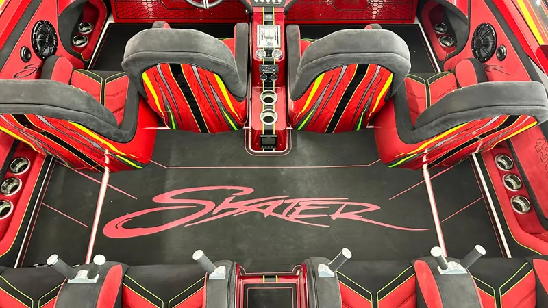 Slide: The Image of Luxurious Skater 438 boat interior, 2021 model, featuring vibrant red and black seating. - 11