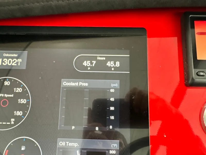 Slide: The Image of Dashboard display of Skater 438, showing odometer, hours, coolant pressure, and oil temperature. - 20