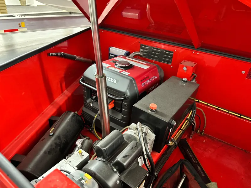 Slide: The Image of Red Skater 438 model engine compartment with Honda GX200 engine, 2021. - 21