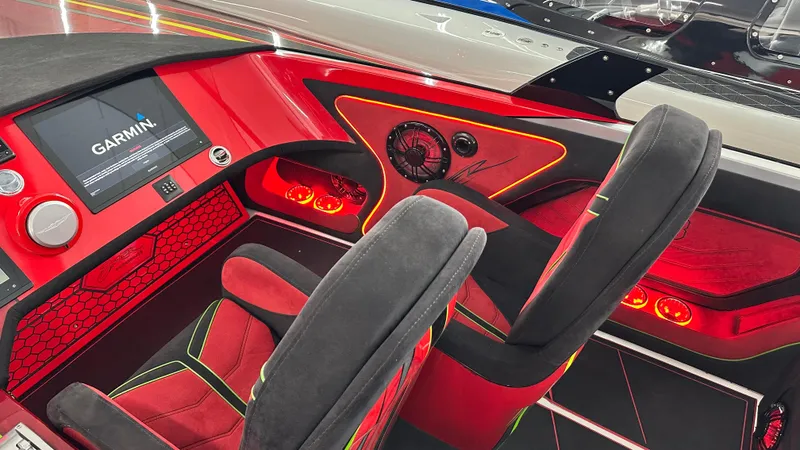 Slide: The Image of Luxury Skater 438 boat interior with red LED lighting and Garmin display, 2021 model. - 8