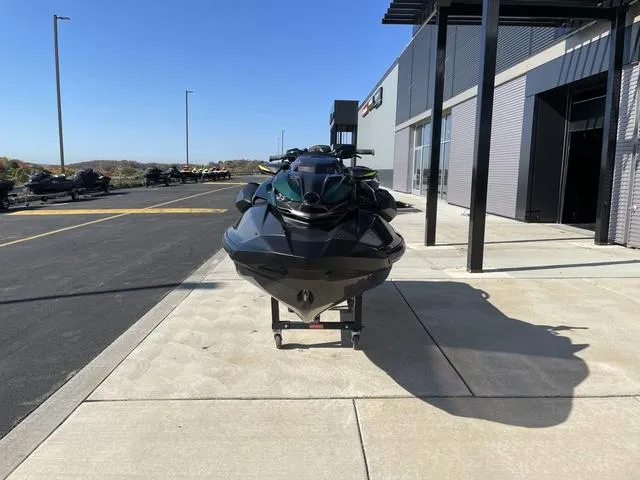 Slide: The Image of 2023 Sea-Doo Waverunner RXP-X Apex 300 parked outside dealership. - 3
