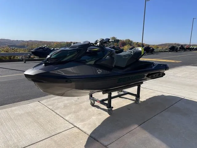 Slide: The Image of 2023 Sea-Doo Waverunner RXP-X Apex 300 on display outdoors. - 4