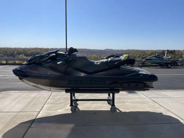 Slide: The Image of 2023 Sea-Doo Waverunner RXP-X Apex 300 on display outdoors. - 5