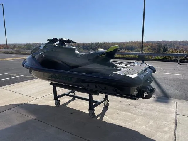 Slide: The Image of 2023 Sea-Doo Waverunner RXP-X Apex 300 on display outdoors. - 6