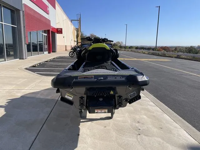 Slide: The Image of 2023 Sea-Doo Waverunner RXP-X Apex 300 parked outside dealership. - 7