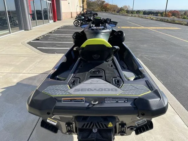 Slide: The Image of 2023 Sea-Doo Waverunner RXP-X Apex 300 parked outdoors. - 9