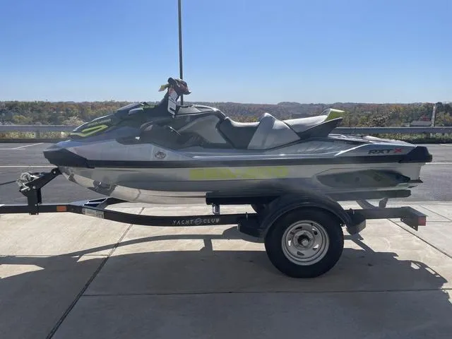 Slide: The Image of 2024 Sea-Doo Waverunner RXT-X 325 in Ice Metal/Mantagreen on trailer. - 5