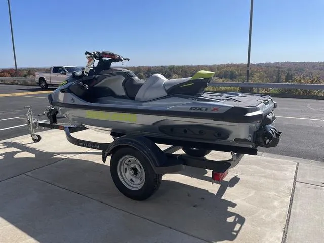 Slide: The Image of 2024 Sea-Doo Waverunner RXT-X 325 in Ice Metal/Mantagreen on trailer. - 6