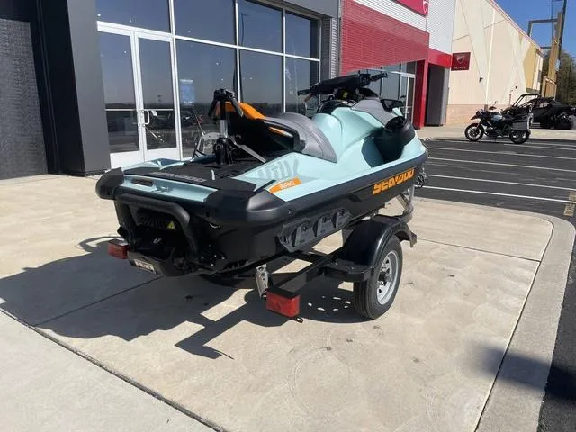 Slide: The Image of 2024 Sea-Doo Waverunner Wake™ 170 on trailer outside dealership. - 8
