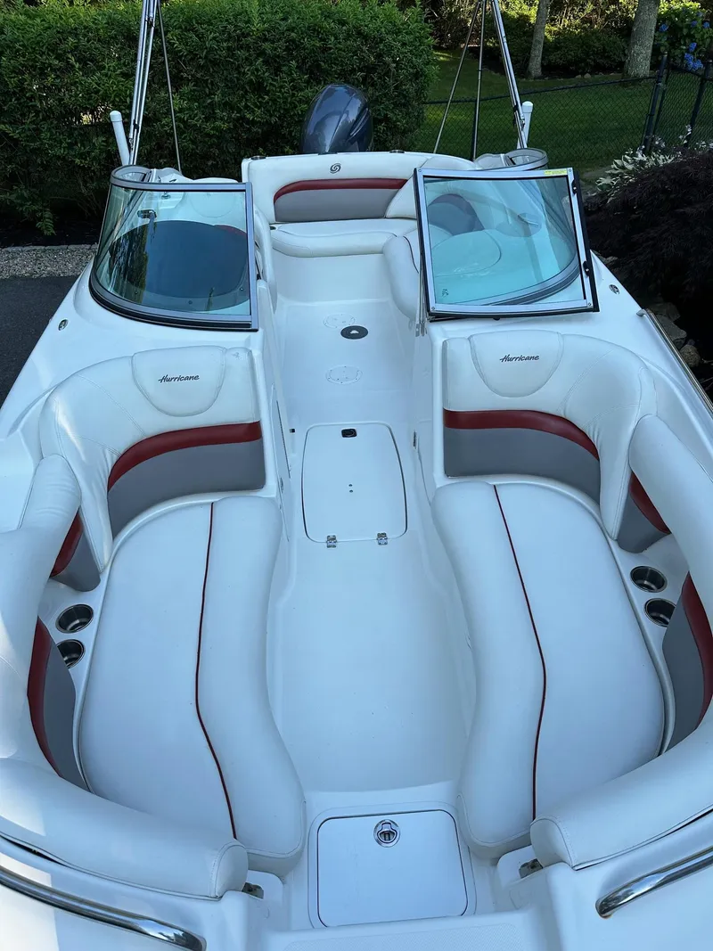 Slide: The Image of 2016 Hurricane SD2200 O/B boat with white and red seating, open deck layout. - 6
