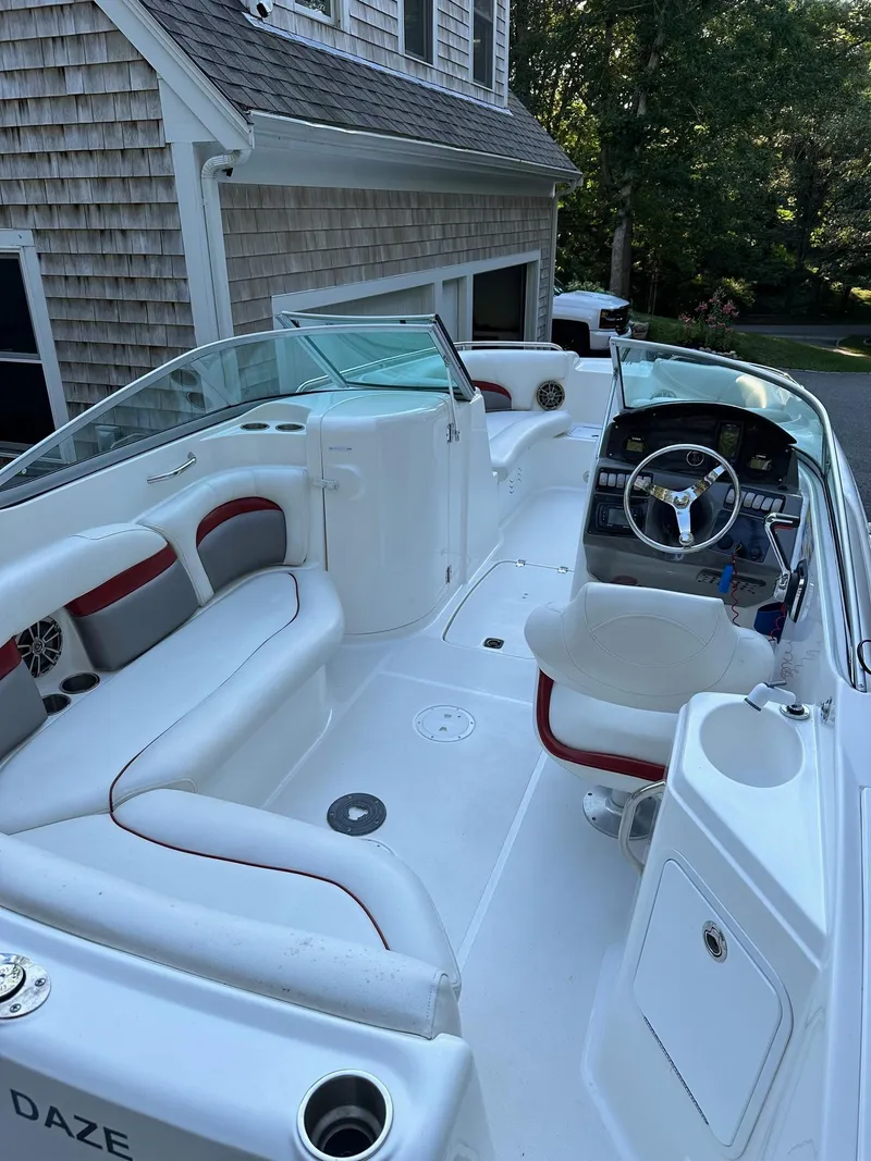 Slide: The Image of 2016 Hurricane SD2200 O/B boat with white seating and modern dashboard. - 7