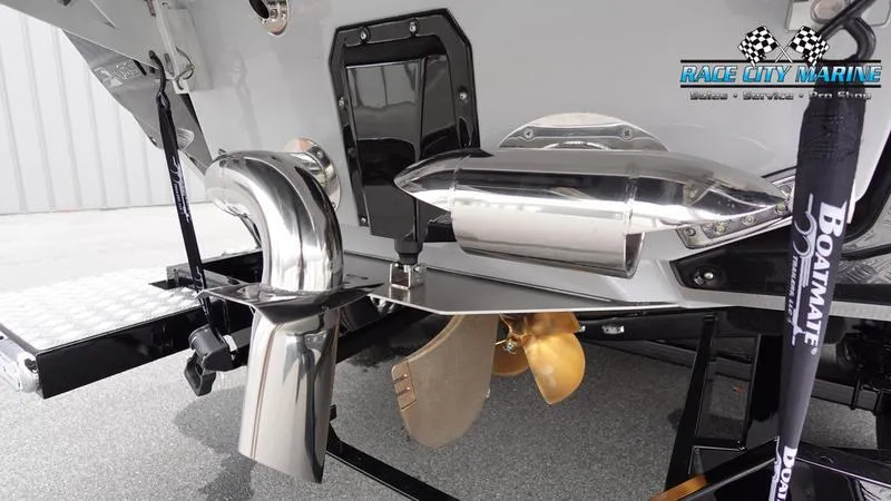 Slide: The Image of 2025 Nautique Super Air Nautique G23 boat propeller and exhaust system close-up. - 10