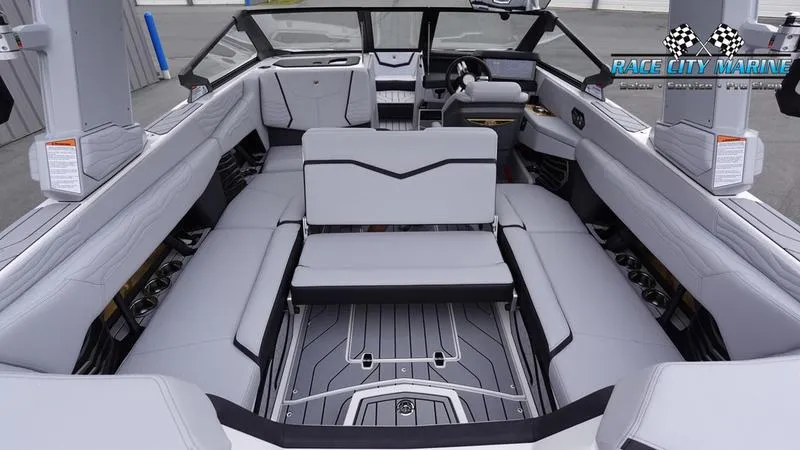 Slide: The Image of Interior of 2025 Nautique Super Air Nautique G23 boat with luxurious seating. - 21