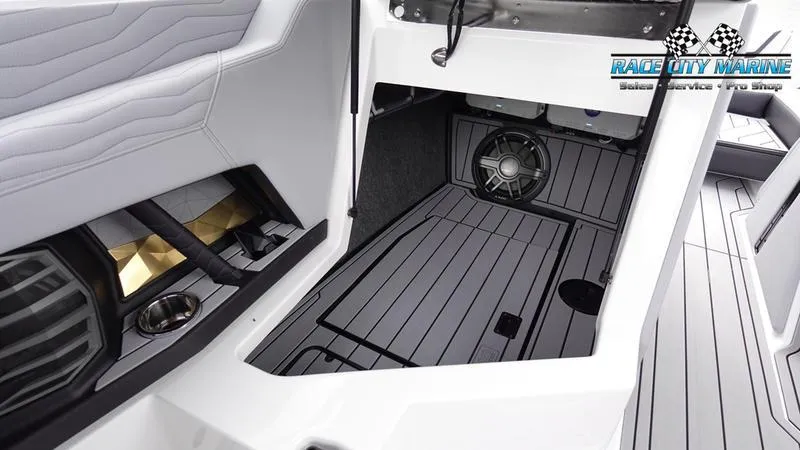 Slide: The Image of 2025 Nautique Super Air Nautique G23 interior with sleek design and premium audio system. - 29