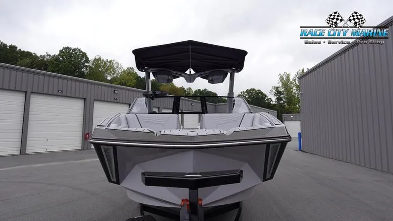 Slide: The Image of 2025 Nautique Super Air Nautique G23 boat at Race City Marine dealership. - 3