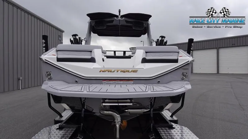 Slide: The Image of 2025 Nautique Super Air Nautique G23 boat at Race City Marine dealership. - 4